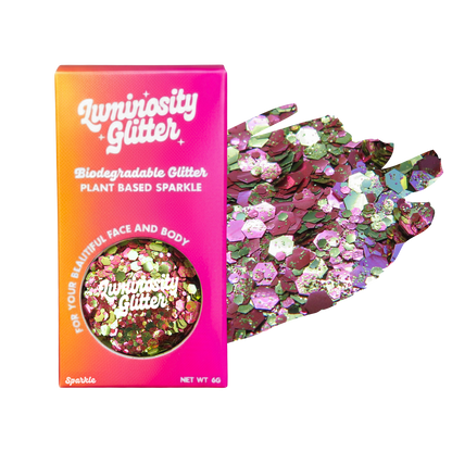 Pink and gold glitter in a bright Luminosity Glitter packaging box
