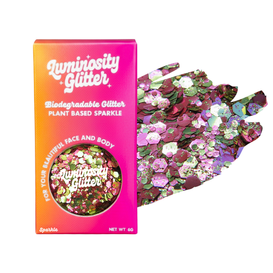 Pink and gold glitter in a bright Luminosity Glitter packaging box