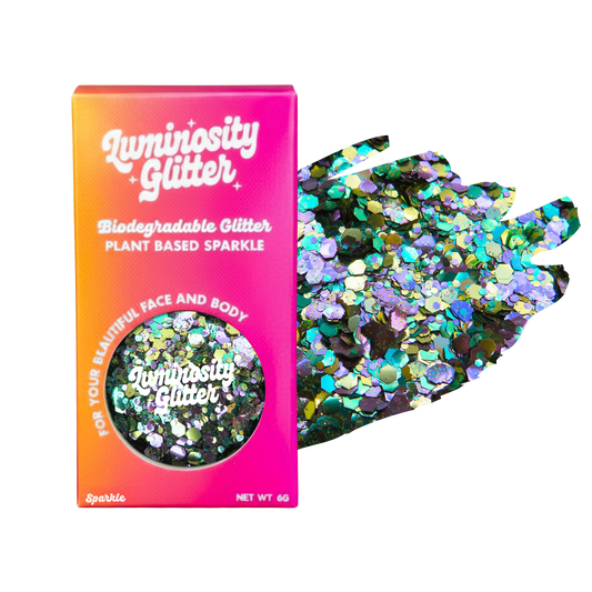 Luminosity Glitter packaging with biodegradable and plant-based sparkle, on a white background.