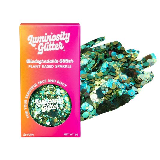 Luminosity Glitter packaging with green glitter on a white background