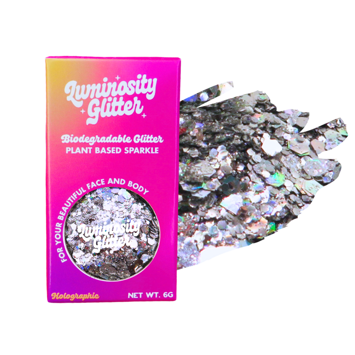 Luminosity Glitter packaging with holographic glitter on a white background