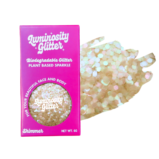 Luminosity Glitter packaging with biodegradable and plant-based glitter on a white background