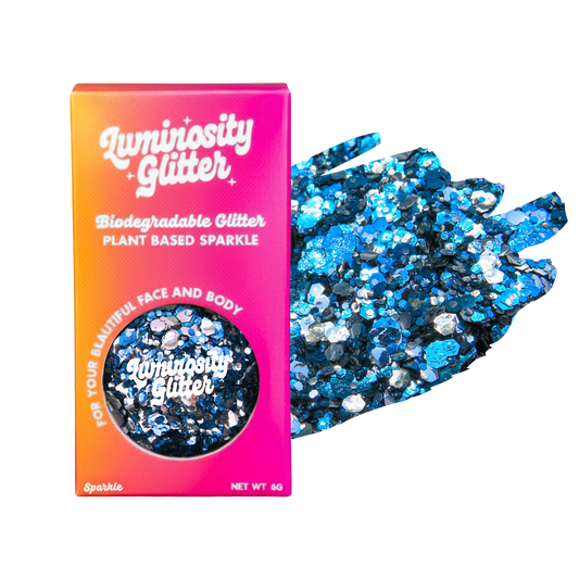 Luminosity Glitter packaging with blue glitter on a white background