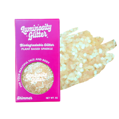 Luminosity Glitter packaging with biodegradable glitter and plant-based sparkle.