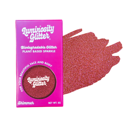 Raspberry fine glitter in a pink and purple ombre packaging box