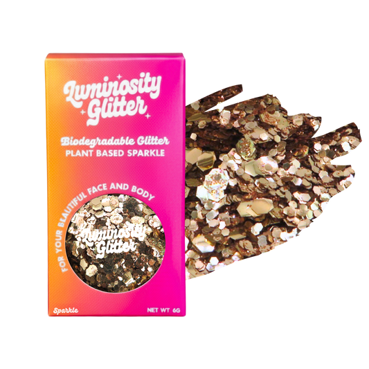Luminosity Glitter packaging with biodegradable and plant-based glitter on a white background