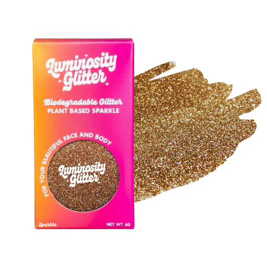Luminosity Glitter packaging with gold glitter swatch on a white background