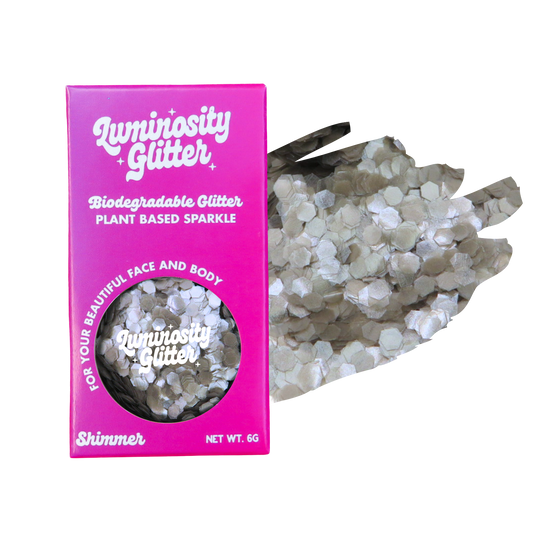 Luminosity Glitter packaging with biodegradable glitter on a white background