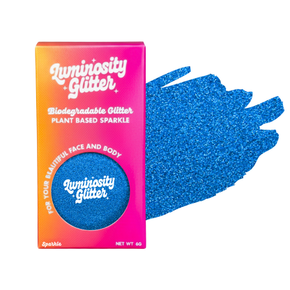 Luminosity Glitter packaging with blue glitter on a white background