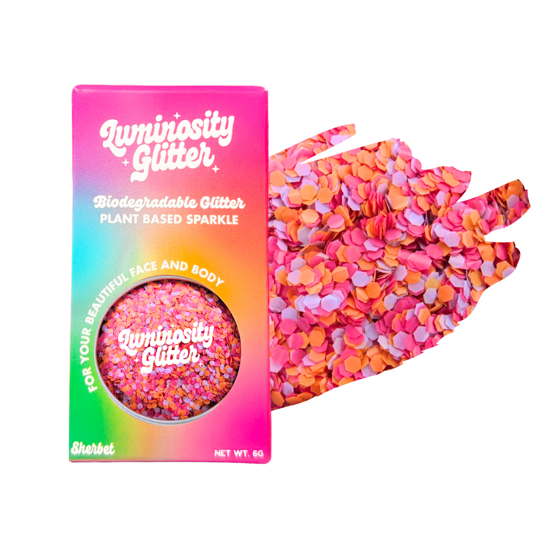Luminosity Glitter packaging with a colorful glitter sample on a white background
