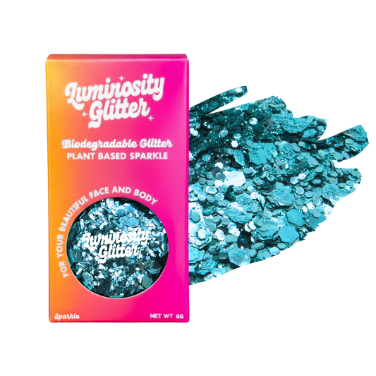 Luminosity Glitter packaging with blue glitter on a white background