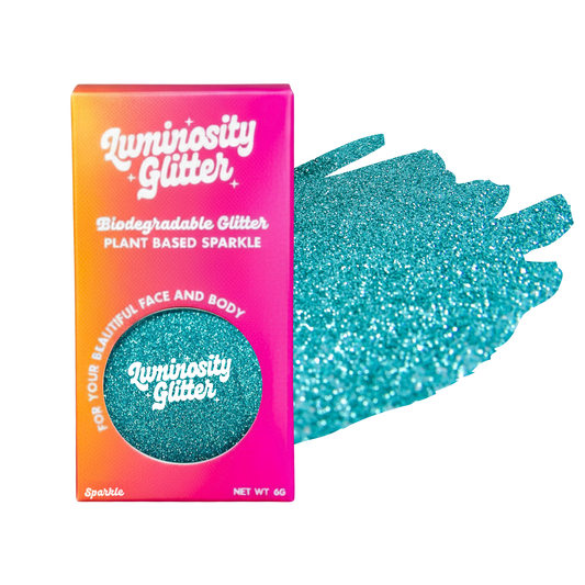 Luminosity Glitter packaging with a sample of blue glitter on a white background