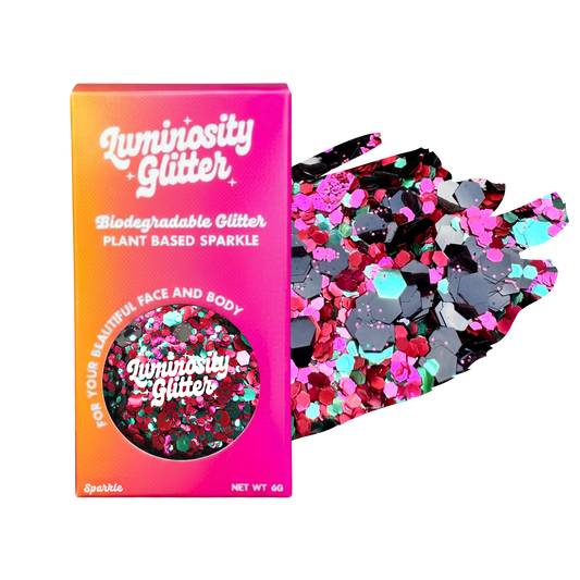 Luminosity Glitter packaging with biodegradable and plant-based glitter on a white background