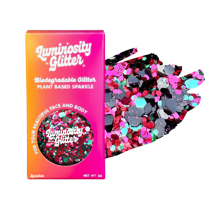 Luminosity Glitter packaging with biodegradable and plant-based glitter on a white background