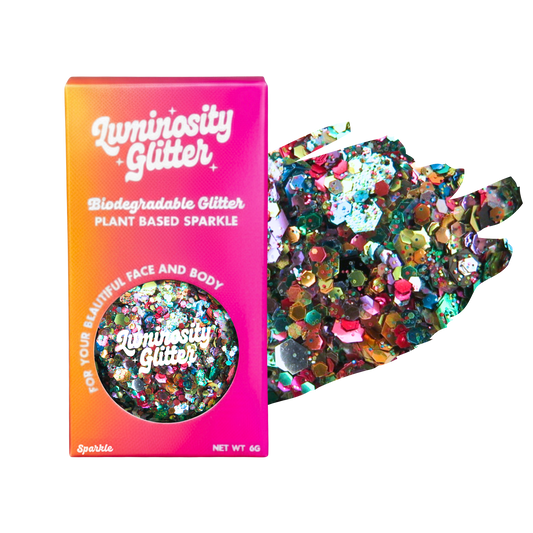 Luminosity Glitter packaging with biodegradable and plant-based sparkle, on a white background.