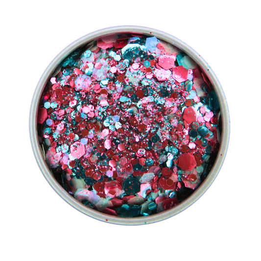 Colorful glitter mix in a round container on a white background