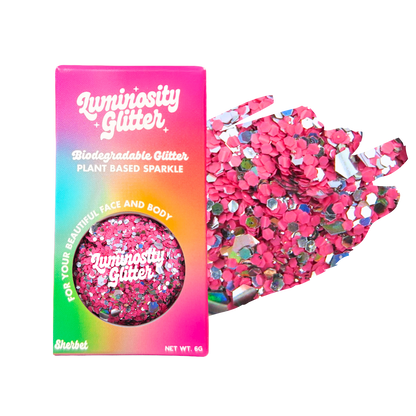 Luminosity Glitter packaging with pink glitter on a white background