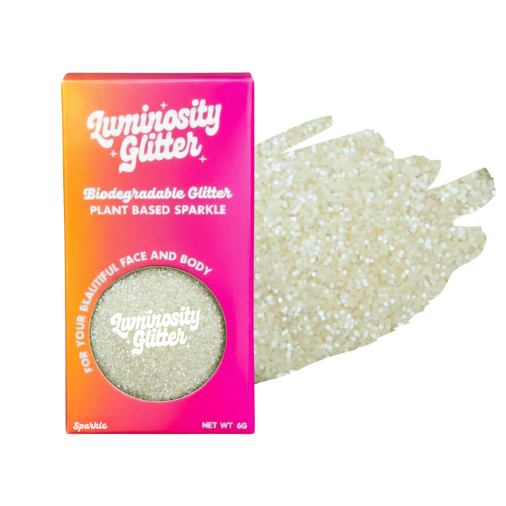 Luminosity Glitter packaging with biodegradable and plant-based sparkle on a white background