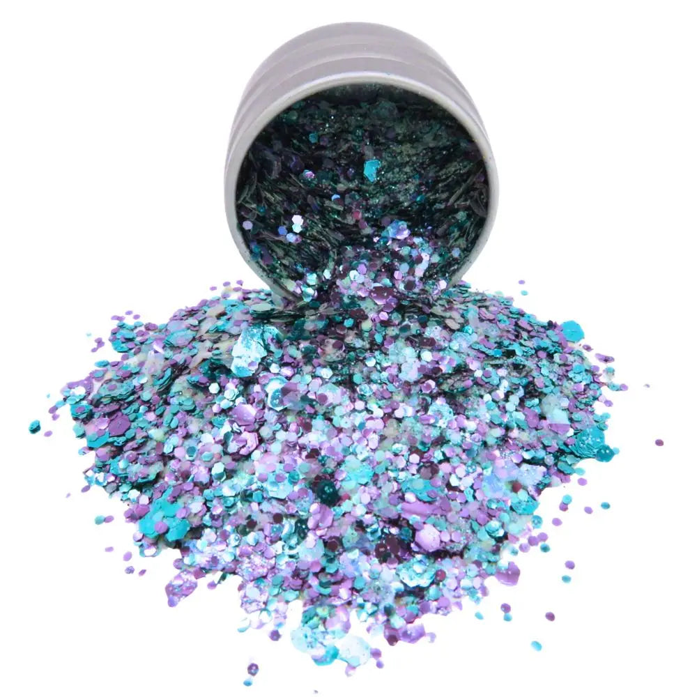 Galaxy biodegradable glitter blend in a 6 gram alumium tin. The blend is made with purple, turquoise and iridscent glitter for extra shimmer.