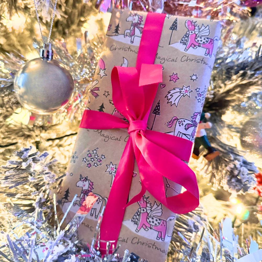 Glitter gift set wrapped using the Luminosity Glitter gift wrap service