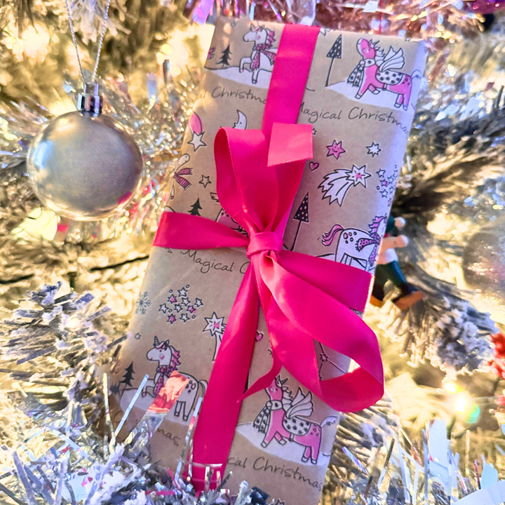 Glitter gift set wrapped using the Luminosity Glitter gift wrap service