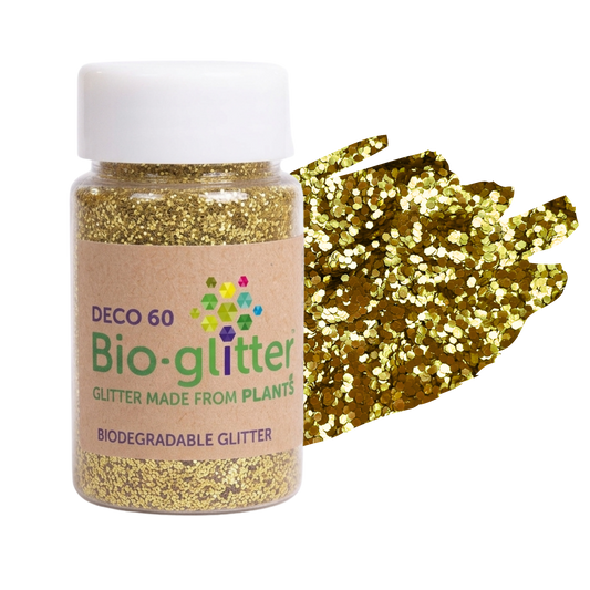 A bottle of chunky craft Bio-glitter DEC0 60 biodegradable glitter with a white cap and a kraft paper label, shown next to a textured swatch of gold glitter on a white background.