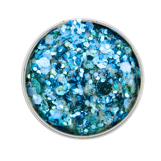 Blue glitter in a small round container on a white background