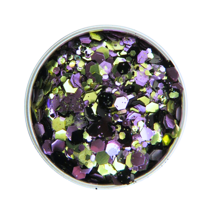 Round container of multicolored glitter on a white background