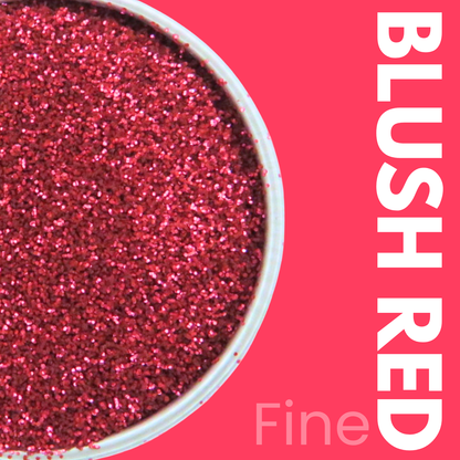 Close-up of blush red glitter in a container with 'Blush Red' text on a pink background