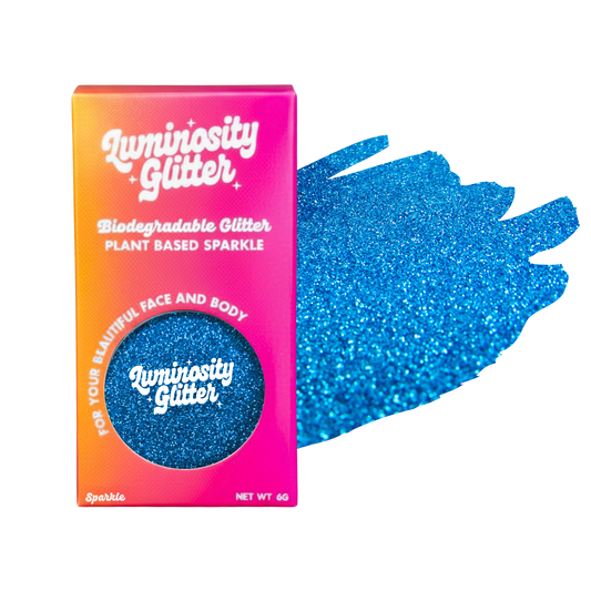 Luminosity Glitter packaging with blue glitter on a white background