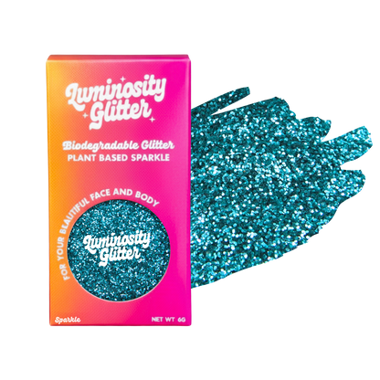 Luminosity Glitter packaging with a sample of blue glitter on a white background