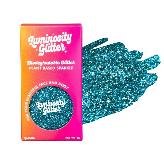 Luminosity Glitter packaging with a sample of blue glitter on a white background